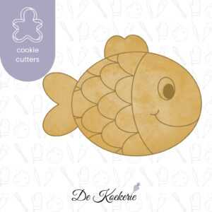 Koekuitsteker in de vorm van een zandvormpje. Het zandvormpje is een visje en maakt deel van de zomercollectie van De Koekerie.