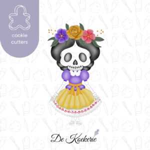 Koek uitsteker in de vorm van een skelet met haar met bloemen erin, en ze draagt een kleedje. Ook wel Catrina genoemd.